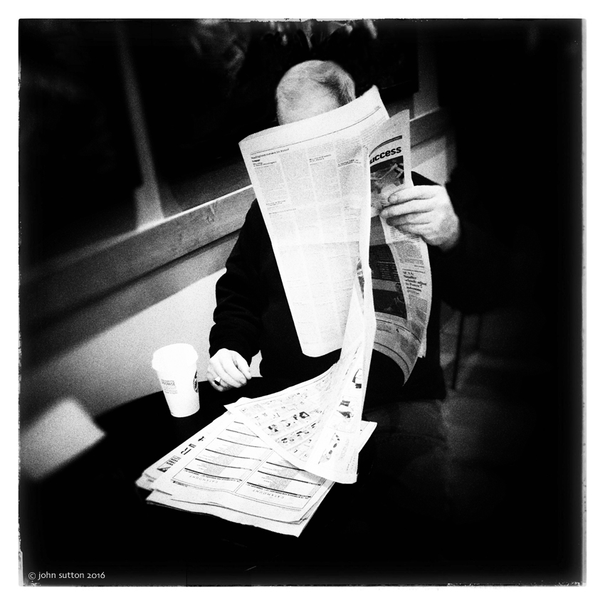 Man Reading a Newspaper post image